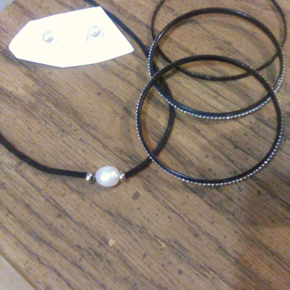 Little black necklace with pearls and bracelets